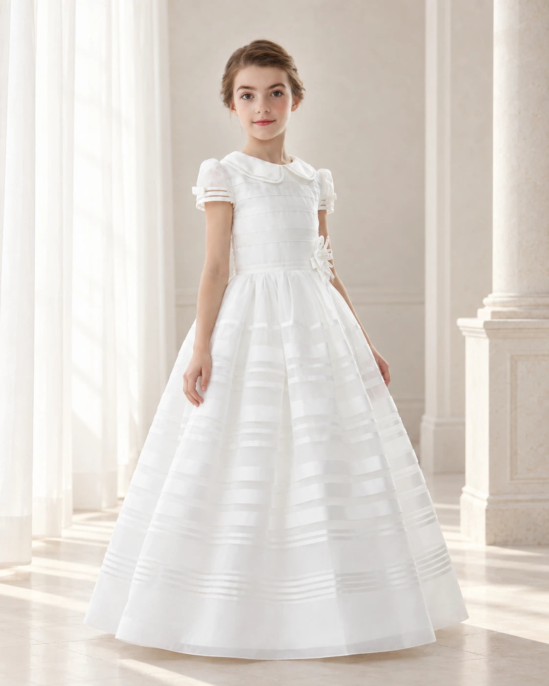 Girl wearing a white First Communion dress with sleeves
